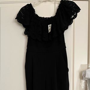 Express black jumpsuit with lace detail. New -  has tags. Size 4.